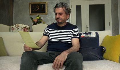 Tuttuğu devasa balıkla sevinç yaşayan öğretmenin mutluluğu yazılan cezayla yarıda kaldı